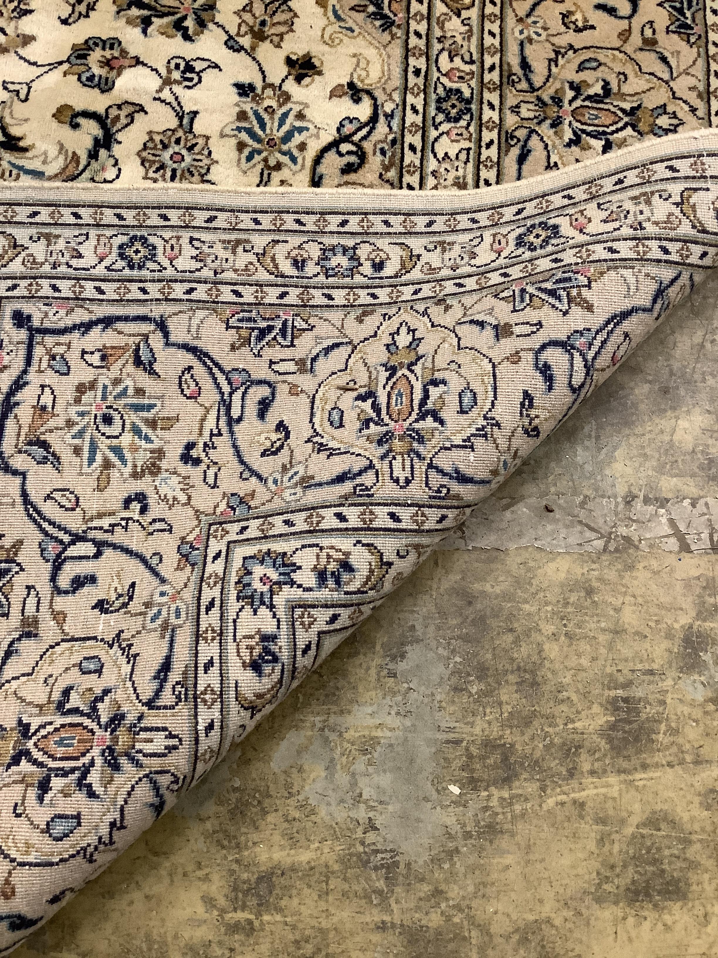 A fine Kashan ivory ground carpet, 291 x 195cm
